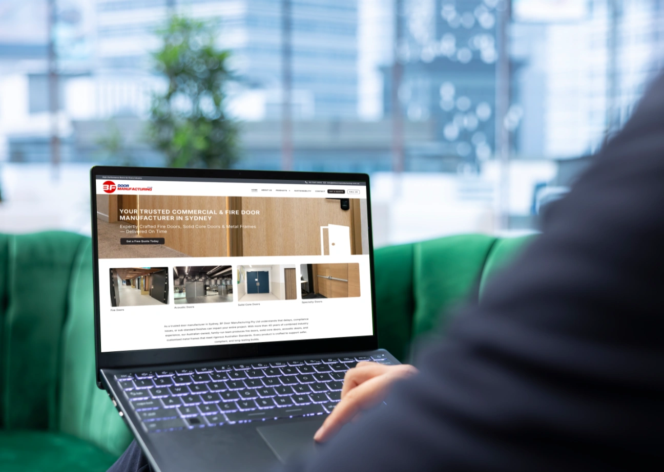 Person browsing a door manufacturer’s website on a laptop.
