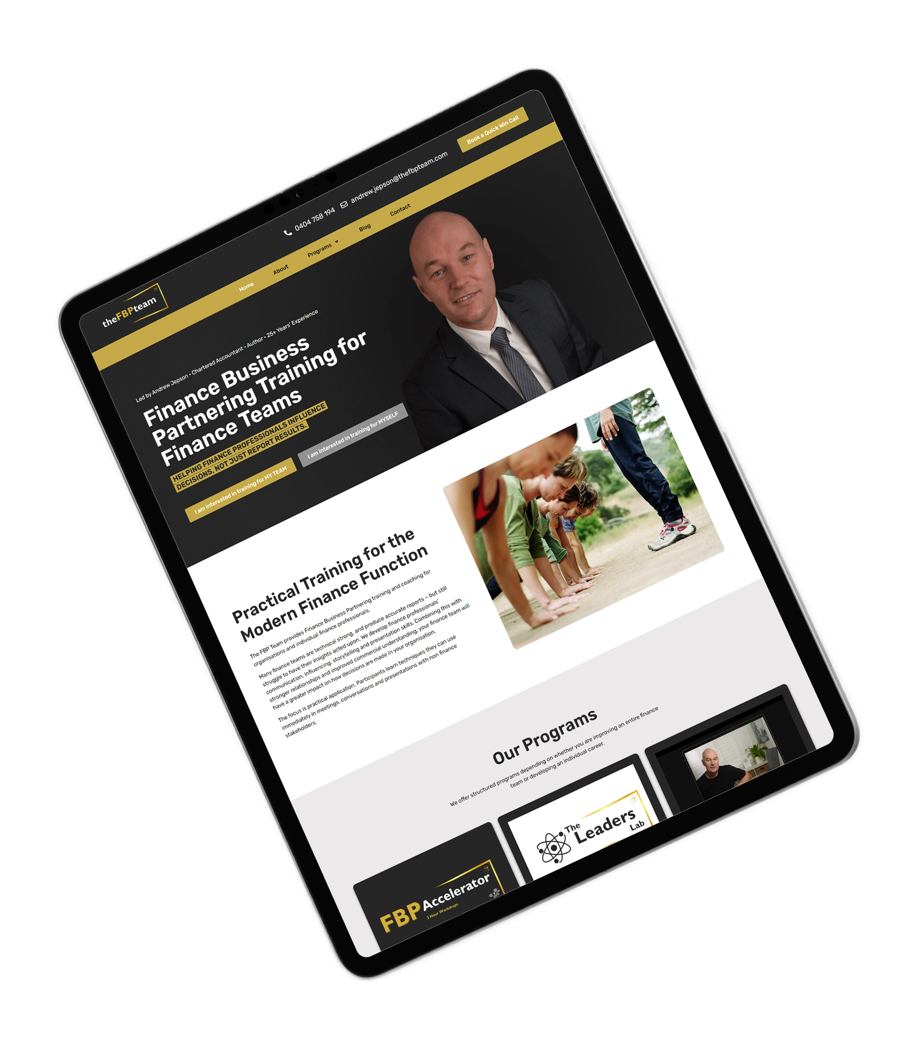 Tablet displaying a finance training website hero with a man in a suit and bold white headline on a dark background