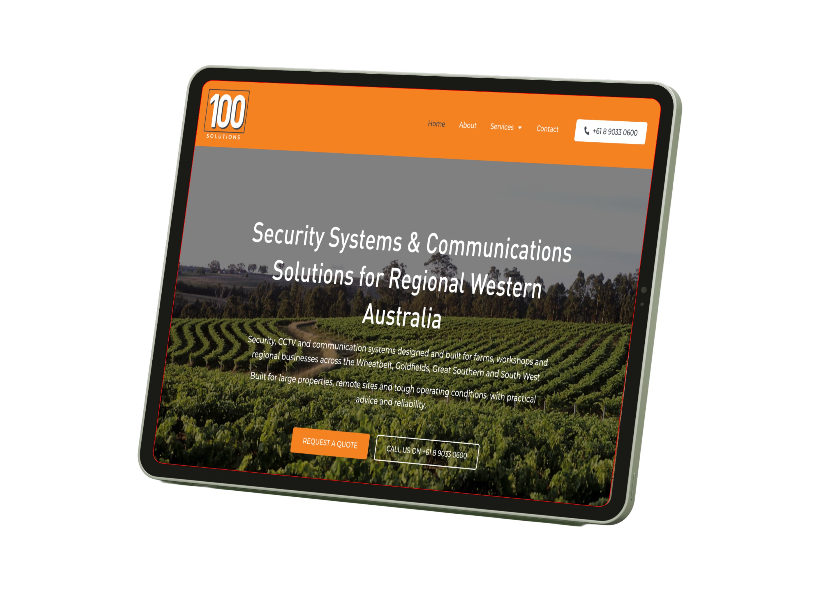 Tablet screen showing a security solutions homepage with an orange header and logo '100 Solutions', headline about Security Systems & Communications for Regional Western Australia over a vineyard image, plus contact buttons nearby